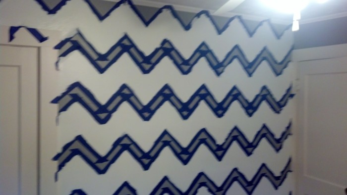 Step 4: Paint the chevron between the tape lines